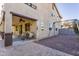 A cozy covered patio, a lush backyard, and a charming swing set, perfect for outdoor entertaining and relaxation at 549 W Sweet Shrub Ave, Queen Creek, AZ 85140