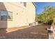 Practical backyard with AC units, gravel, and room for outdoor projects or storage, offering versatility and functionality at 549 W Sweet Shrub Ave, Queen Creek, AZ 85140