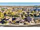 Aerial view of a residential neighborhood showcasing the community's layout and landscaping at 549 W Sweet Shrub Ave, Queen Creek, AZ 85140
