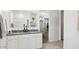 Main bathroom with dual sinks, granite counters, and a separate shower at 5771 E Axle Ln, San Tan Valley, AZ 85140
