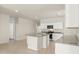 Kitchen with white cabinets, granite countertops, stainless steel appliances, and tile flooring at 5771 E Axle Ln, San Tan Valley, AZ 85140