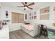 This delightful ' bedroom is bright and cheerful with room for study and a comfortable place to relax at 6526 W West Wind Dr, Glendale, AZ 85310