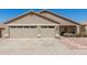 Charming single-story home featuring a three-car garage and well-maintained desert landscaping at 6526 W West Wind Dr, Glendale, AZ 85310