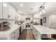 Bright kitchen with white cabinets, stainless steel appliances, and spacious countertops at 6526 W West Wind Dr, Glendale, AZ 85310