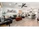 Inviting living room connects to the kitchen, featuring a large sofa and stylish decor at 6526 W West Wind Dr, Glendale, AZ 85310