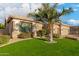 Beautiful single-story home with lush green grass and desert landscaping at 6751 S Callaway Dr, Chandler, AZ 85249