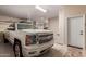 Garage featuring a truck, and a ceiling fan at 6751 S Callaway Dr, Chandler, AZ 85249