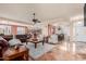 Open-concept living room with access to the kitchen and dining area, great for entertaining at 6751 S Callaway Dr, Chandler, AZ 85249