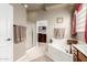 Main bathroom showcasing a soaking tub, walk-in shower, and a walk-in closet at 6751 S Callaway Dr, Chandler, AZ 85249