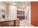 Office featuring custom cabinets and desk, and marble floors at 6751 S Callaway Dr, Chandler, AZ 85249