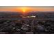 Stunning aerial view of the community homes as the sun sets over the desert horizon at 6929 E Trailridge Cir, Mesa, AZ 85207
