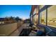 Relaxing balcony with comfortable seating and scenic views, accessible from the adjacent bedroom at 6929 E Trailridge Cir, Mesa, AZ 85207