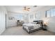 Bright bedroom with neutral tones, large windows, and a cozy, inviting atmosphere at 6929 E Trailridge Cir, Mesa, AZ 85207