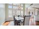 Bright dining room featuring large windows and stylish chandelier at 6929 E Trailridge Cir, Mesa, AZ 85207