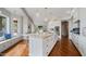 Bright open kitchen featuring stainless steel appliances, a large island, and a window seat, great for Gathering gatherings at 6929 E Trailridge Cir, Mesa, AZ 85207