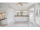 Spacious main bathroom with double vanity, tub and separate tiled shower at 6929 E Trailridge Cir, Mesa, AZ 85207