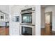 Gourmet kitchen with built-in stainless steel oven and microwave at 6929 E Trailridge Cir, Mesa, AZ 85207
