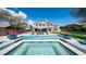 Backyard features a refreshing pool and spa, creating an ideal outdoor living space at 6929 E Trailridge Cir, Mesa, AZ 85207