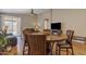 Open-concept dining room boasts hardwood floors and modern furnishings at 7115 E Olla Ave, Mesa, AZ 85212