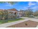 Charming single-Gathering home with a well-manicured lawn, neutral paint, and a two-car garage at 7115 E Olla Ave, Mesa, AZ 85212