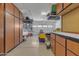 Garage with storage cabinets and overhead storage at 7115 E Olla Ave, Mesa, AZ 85212
