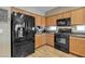 This lovely kitchen features stainless steel appliances and ample cabinet space at 7115 E Olla Ave, Mesa, AZ 85212