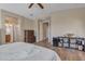 Spacious main bedroom with hardwood floors and views into the main bathroom at 7115 E Olla Ave, Mesa, AZ 85212