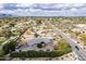 Wide angle shot of a home with an expansive backyard area, situated on a street with convenient neighborhood access at 7131 E Cholla St, Scottsdale, AZ 85254