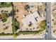 Bird's eye perspective of a house with mature landscaping and a spacious yard, near well-maintained streets at 7131 E Cholla St, Scottsdale, AZ 85254