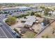 Expansive aerial view of a single-story home boasting a spacious lot and convenient access to nearby amenities at 7131 E Cholla St, Scottsdale, AZ 85254