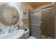 Well-maintained bathroom with a sleek shower and vanity, offering convenience and comfort at 7131 E Cholla St, Scottsdale, AZ 85254