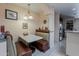 Cozy breakfast nook features booth seating and a charming light fixture, perfect for casual dining at 7131 E Cholla St, Scottsdale, AZ 85254