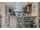 Open kitchen boasts a breakfast bar with seating, perfect for entertaining and casual meals at 7131 E Cholla St, Scottsdale, AZ 85254