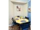 Cozy dining area offers seating for four near a sunlit corner at 7750 E Broadway Rd # 433, Mesa, AZ 85208