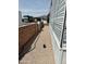 Exterior view of home with gravel landscaping and RV parking at 7750 E Broadway Rd # 433, Mesa, AZ 85208