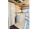 Functional laundry room features a washer, dryer, and storage cabinets for an organized space at 7750 E Broadway Rd # 433, Mesa, AZ 85208
