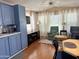 Open living space featuring a cozy seating area and a view of the connected kitchen at 7750 E Broadway Rd # 433, Mesa, AZ 85208