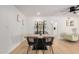 Bright dining area featuring modern table, stylish chairs, and contemporary decor on floating shelves at 7811 N 32Nd Ave, Phoenix, AZ 85051