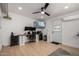 Bright office space with ceiling fan, natural light, and large desk setup at 7811 N 32Nd Ave, Phoenix, AZ 85051