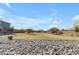 Enjoy the community park with lush green space, walking paths, and mature trees at 797 W Danish Red Trl, San Tan Valley, AZ 85143