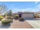 Charming single-story home featuring desert landscaping and a two-car garage at 797 W Danish Red Trl, San Tan Valley, AZ 85143