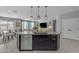 Kitchen island with a sink and dishwasher at 797 W Danish Red Trl, San Tan Valley, AZ 85143