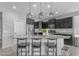 Kitchen island featuring pendant lighting and granite countertops at 797 W Danish Red Trl, San Tan Valley, AZ 85143