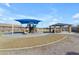 Community playground with a shaded picnic area for outdoor Gathering gatherings at 797 W Danish Red Trl, San Tan Valley, AZ 85143
