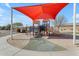 Community playground featuring modern play equipment and a vibrant shade structure at 797 W Danish Red Trl, San Tan Valley, AZ 85143