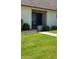 Charming townhome front entrance with well manicured green grass at 8101 N 107Th Ave # 26, Peoria, AZ 85345