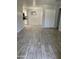 Open living space features wood-look tile flooring and neutral paint at 8101 N 107Th Ave # 26, Peoria, AZ 85345