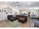 Open-concept living room seamlessly connects to the kitchen, offering ample space for entertaining and relaxing at 8260 W Cielo Grande Ave, Peoria, AZ 85383