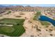 Aerial view showcasing the well-maintained golf course and desert landscape surrounding the community at 85 W Grey Stone St, San Tan Valley, AZ 85143