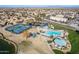 Community amenities include a pool, playground, tennis courts, and park in a residential neighborhood at 85 W Grey Stone St, San Tan Valley, AZ 85143